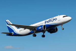 IndiGo Airbus A320neo aircraft taking off against a clear blue sky, representing the new daily direct flight route from Delhi to Guangzhou launched by IndiGo Airlines.